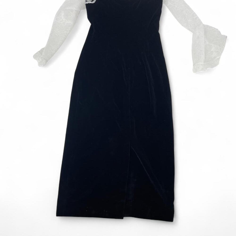 DÔEN black velvet midi dress with white lace sleeves. Size: S